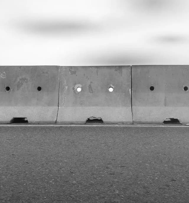 Close-up of precast concrete road divider kerb stones